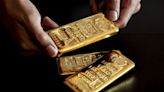 Gold Holds Near Record as Fed Rate-Cut Optimism Mounts