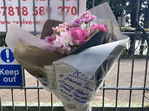 Flowers left after 16-year-old boy dies in Cambridge lake tragedy