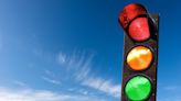 Red, yellow, green ... and white? Smarter vehicles could mean big changes for the traffic light