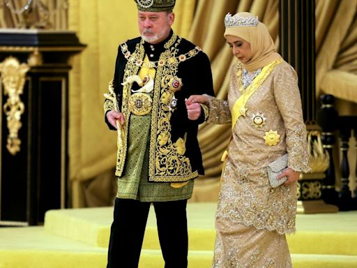 Malaysia honors a new king in coronation marked by pomp and cannon fire