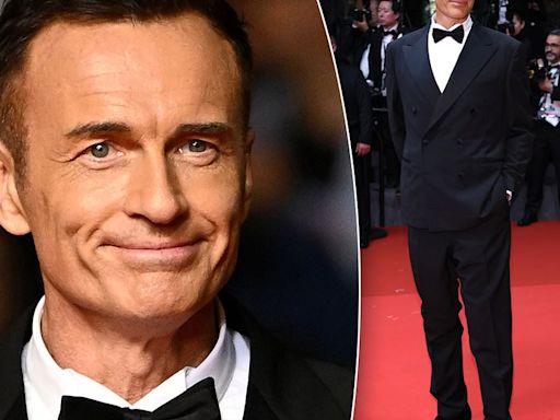 Julian McMahon reveals his very bronzed complexion at Cannes