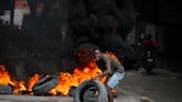 Haiti's prime minister calls for calm as violent protests seek his ouster