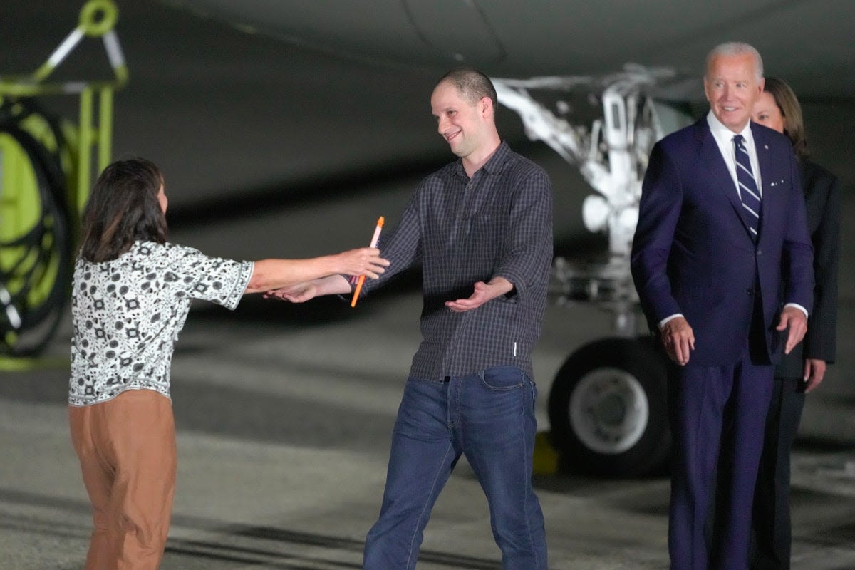 Evan Gershkovich and fellow freed Americans welcomed back to US by Biden and Harris after Russia prisoner swap