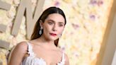 Elizabeth Olsen Goes Ethereal in White Vivienne Westwood Lace Dress at Golden Globes 2024