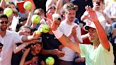 Fans line up in cool Roland Garros weather as French Open begins