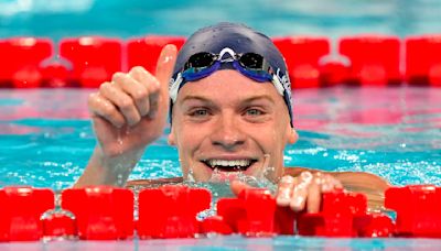 With French fans cheering every stroke, Marchand cruises to fastest time in men's medley