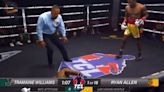 Boxer collapses mid-fight with apparent seizure as referee waves off bout