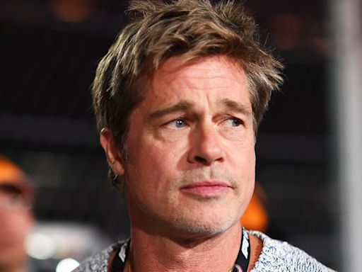 Brad Pitt makes rare joint outing with girlfriend Ines de Ramon as couple hold hands at Grand Prix