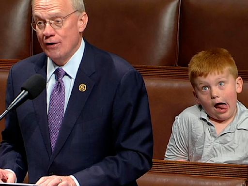 Congressman's son steals the show making silly faces behind dad during speech on the House floor