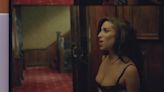 Amy Winehouse Takes a Hotel Stroll in New ‘In My Bed’ Lyric Video Featuring Previously Unseen Footage