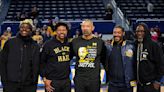 Michigan's Fab Five reunites to support Howard, attends 1st basketball game at Crisler in 3 decades