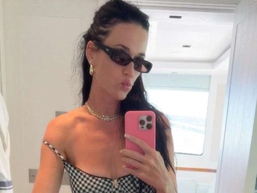 Katy Perry serves holiday style inspo in crochet beach cover-up and belly chain