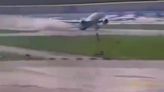 Moment packed Boeing 777 scrapes tail along Italian runway