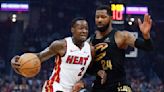 Terry Rozier's go-ahead 3-pointer with 14.5 seconds left helps the Heat beat the Cavaliers 107-104