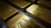 Gold dips as dollar gains on sharp rate-hike bets after U.S. CPI data