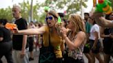 Barcelona anti-tourism protesters fire water pistols at visitors