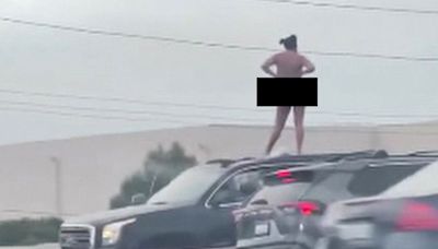 Woman leads CHP on pursuit, climbs out sunroof, gets naked on top of vehicle on the 405 Freeway