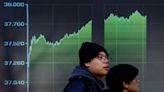 Asia stocks touch 15-month top, wary of US inflation
