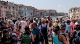 Protests as Venice begins charging entry fee for day-trippers