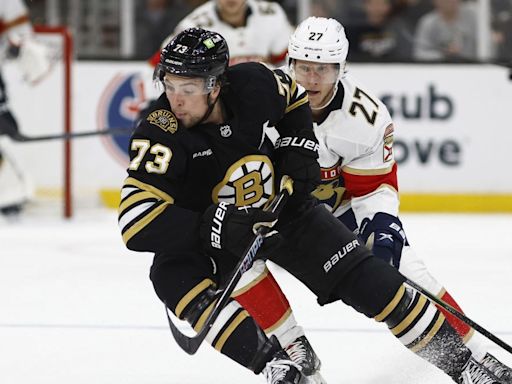 WATCH: Bruins' Charlie McAvoy drills Sam Reinhart with massive hit