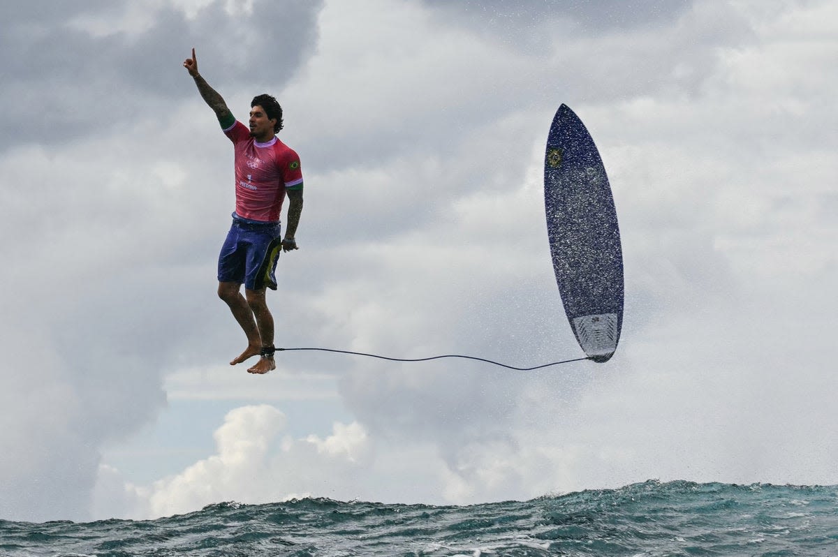 Is this the photo of the Olympics? Stunning shot of surfer Gabriel Medina goes viral