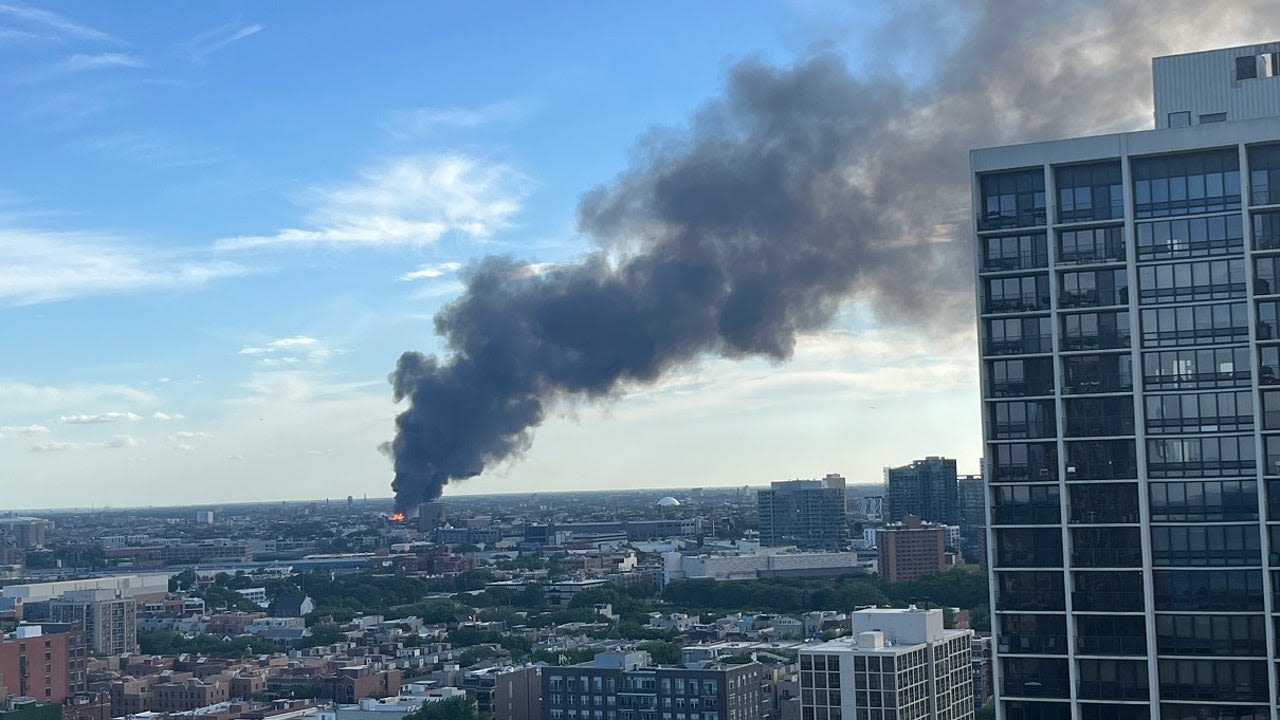 Massive fire erupts at West Town pallet yard