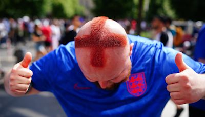 Barber who shaved St George cross into his hair among fans in Berlin