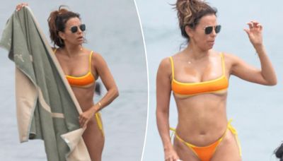 Eva Longoria shows some skin in a cheeky bikini on Spanish beach