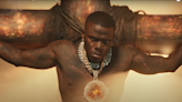 DaBaby Survives Crucifixion In “Tough Skin” Video