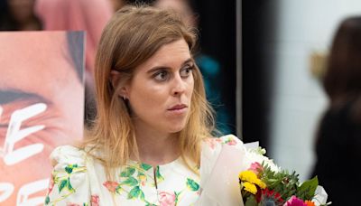Princess Beatrice looks chic in summery dress at London school