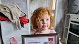 Two-year-old honoured for quick-thinking after neighbours saved from fire