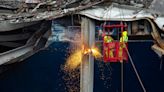 PHOTOS: Preparations underway for removing section of Key Bridge from Baltimore port