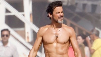 Matt Bomer Shows Off Ripped Shirtless Physique & Lower Back Tattoo While Filming Beach Scenes for New Movie ‘Outcome’