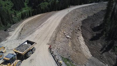 Contractors begin hauling asphalt to the Teton Pass detour site