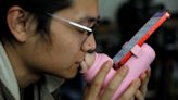 Can a machine replace a kiss? Chinese start-up’s new invention raises eyebrows and excitement