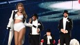 Travis Kelce says he told himself 'don't drop the baby' while carrying Taylor Swift onstage at the Eras Tour