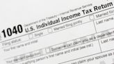 Watchdog says IRS still swamped by tax return backlog