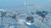 Moment US jets come face to face with Vlad & Xi bombers for 1st time
