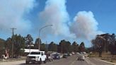 Residents flee New Mexican village as wildfires bear down on homes