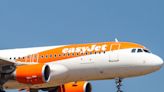 A flight from England to Spain's Canary Islands had to be diverted for police to meet disruptive passengers, easyJet said