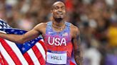 Quincy Hall's brother barks like a dog while reacting to 400m gold