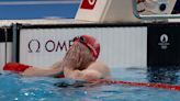 France's Léon Marchand wins first Olympic title in individual medley in front of roaring home crowd