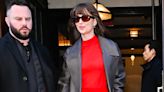 Dakota Johnson wears the colour of the moment, bright red