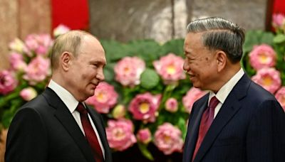 Russia and Vietnam vow to strengthen ties as Putin visits