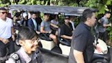 Football superstar Cristiano Ronaldo's buggy chased by fans at Singapore Botanic Gardens