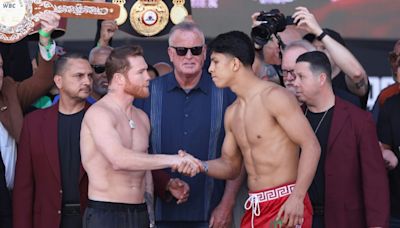 Alvarez, Munguia make weight for super-middleweight world title bout