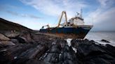 Ghost ship spotted washed up after 17 MONTHS at sea - with not a soul onboard