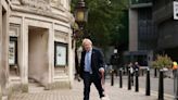 Former Prime Minister Boris Johnson turned away from polling station after fo...