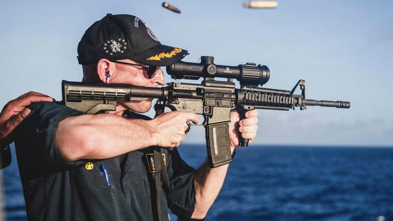 US Navy warship commander relieved of duty following image of him shooting rifle with scope mounted backward