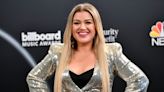 Kelly Clarkson reignites the great celebrity bathing debate by admitting she pees in the shower 'almost every time': 'I feel productive'